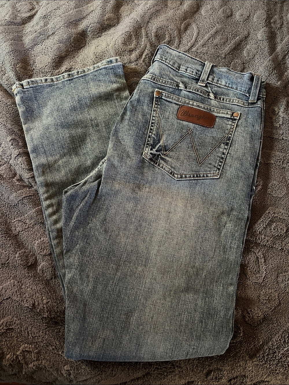 Wrangler Men's Faded Light Blue Bootcut Jeans